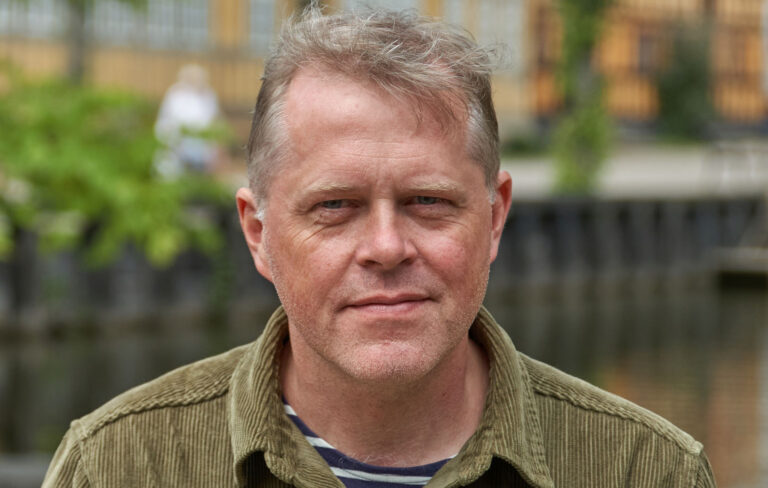 Porträttbild på en man.
